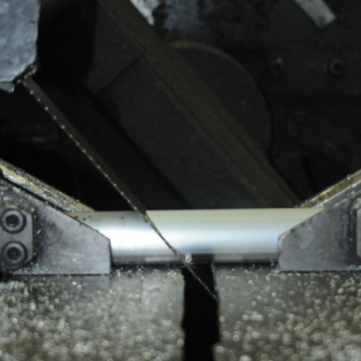 CNC mitre saw for multiple angle metal cuts